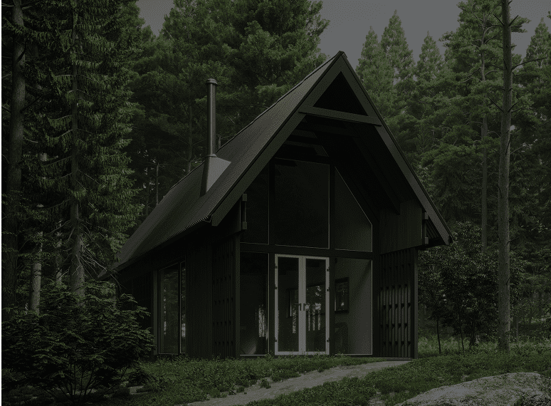 Modern cabin surrounded by lush green forest.